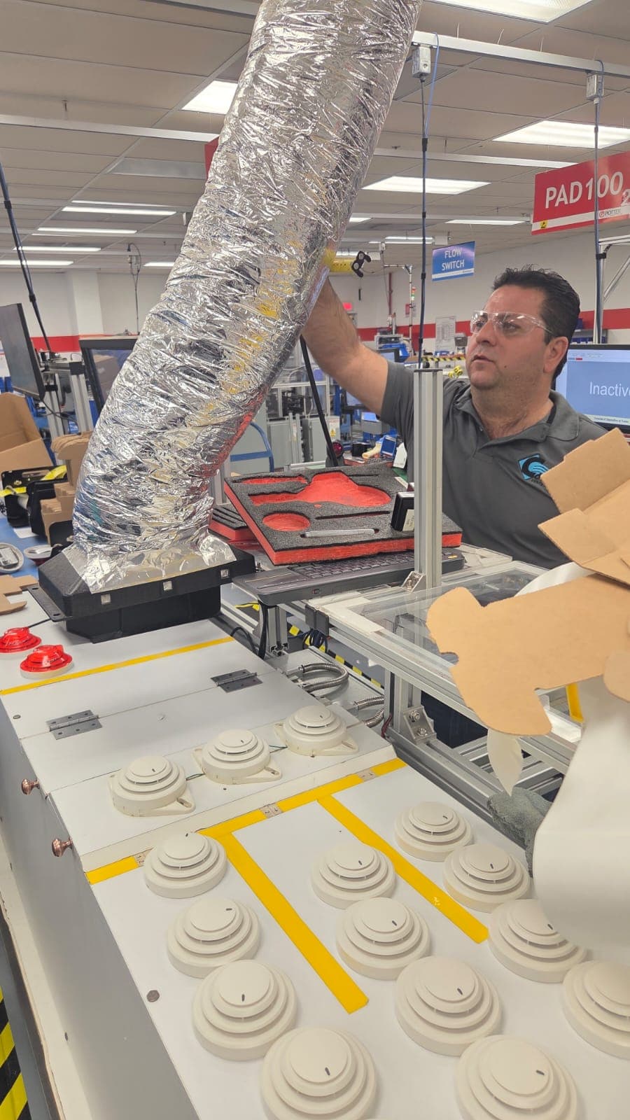 Sistema de extracción en maquiladora - vista vertical